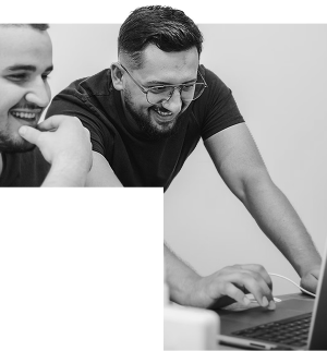 E2M team member and agency partner collaborating — black label standard quality and execution