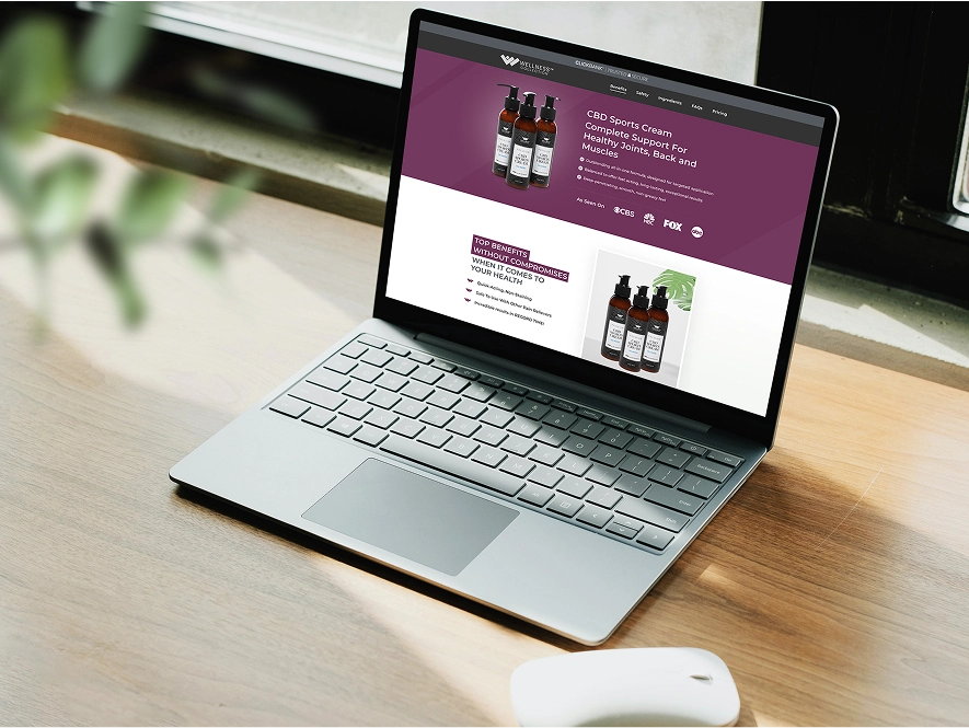 White label BigCommerce store design and development — laptop displaying ecommerce product website interface for building and managing online stores
