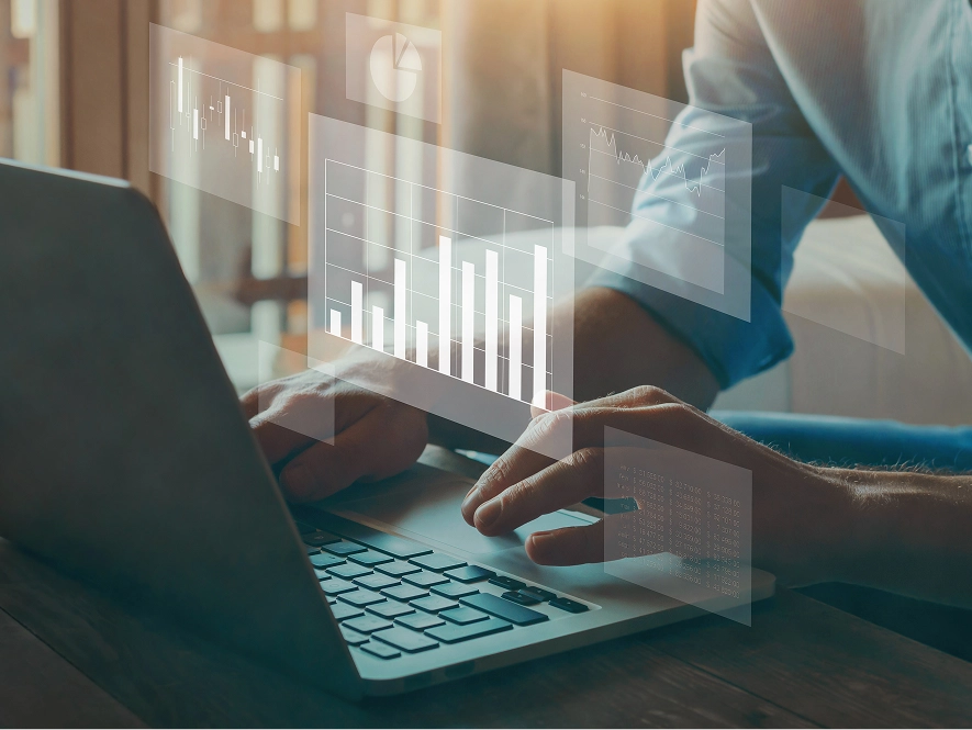 White label campaign optimization, bidding and scaling — professional working on laptop with transparent 3D graph interface