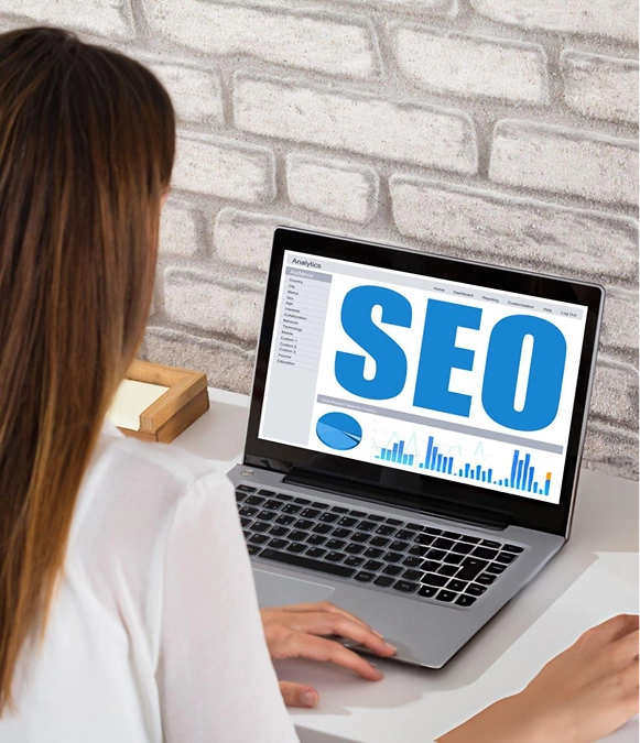 White label category pages SEO — professional working on laptop with SEO screen optimizing category structure