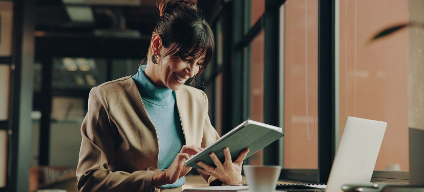 White label content writing and copywriting services — professional using iPad with focused interaction creating conversion-driven content