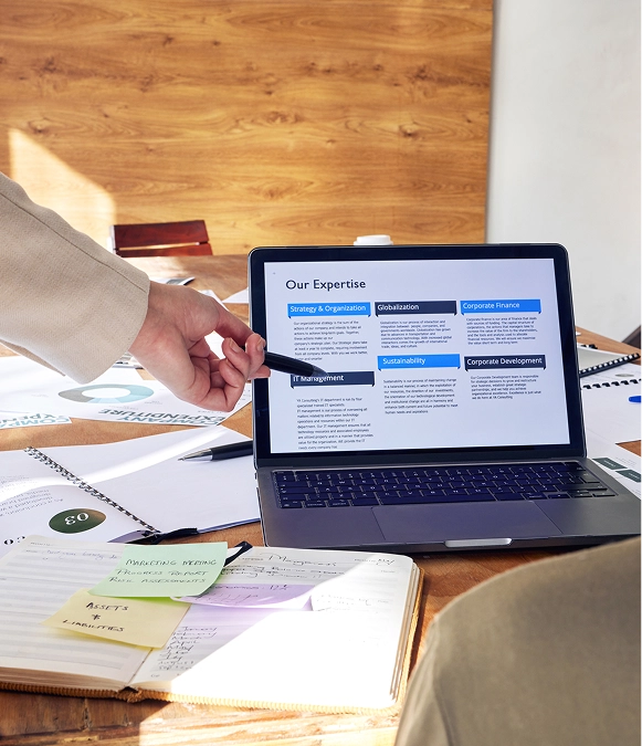 White label Duda content migration tools — laptop displaying website content with documents and papers organized for migration process