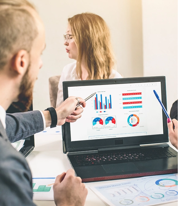White label Duda SEO-friendly features — team reviewing website performance graphs on screen to improve search visibility
