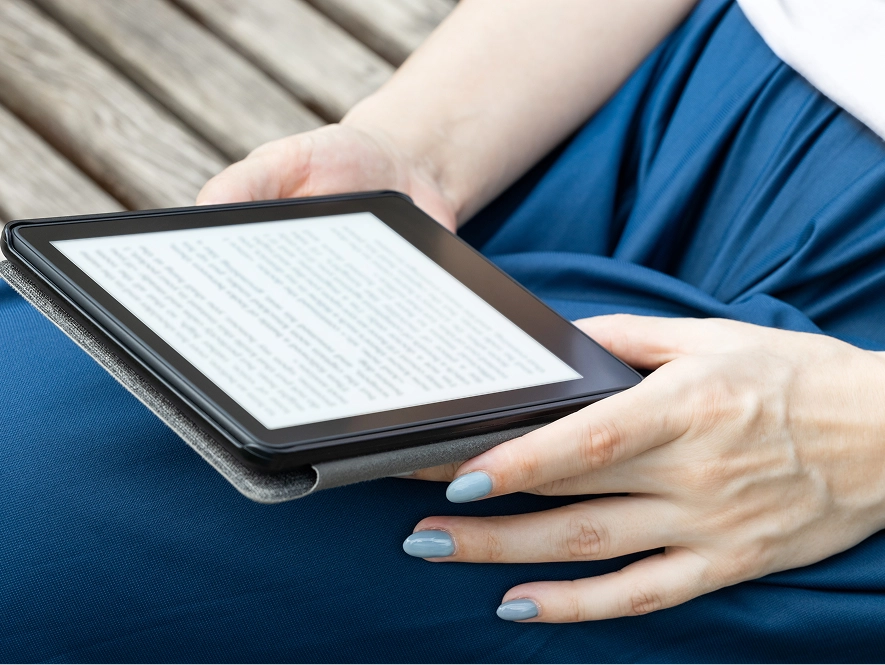 White label ebook writing services — reading and reviewing content on iPad