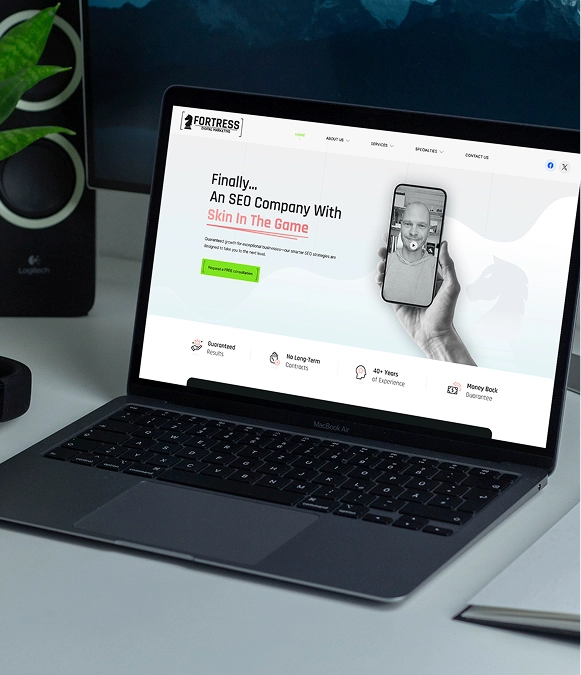 White label landing page design — laptop on table displaying a website landing page