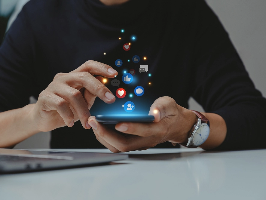White label Meta campaign types and placement strategy — user focused on mobile with social icons like reactions, comments and shares emerging