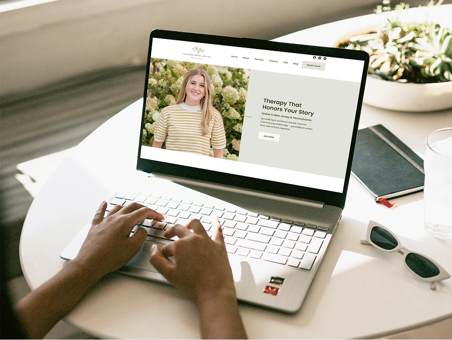 White label Oxygen Builder custom functionality — person developing advanced website features on laptop with website interface visible on screen