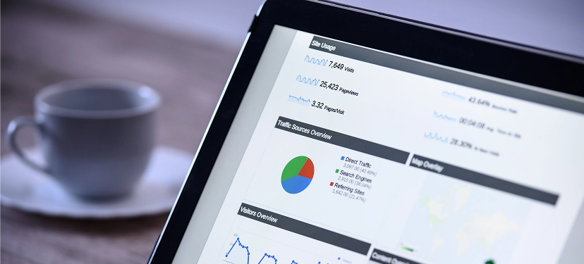 White label SEO-friendly ecommerce website content writing — iPad displaying analytics and performance graphs for optimized product and category pages