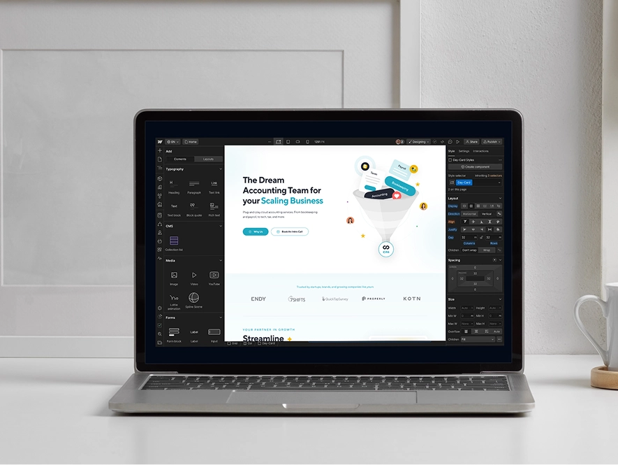 White label Webflow custom functionality and integrations — laptop displaying Webflow builder interface with advanced features and development options on screen